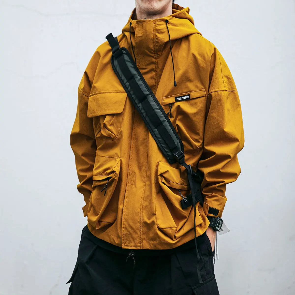 Damián | Chubasquero Hombre Impermeable con Capucha Múltiples Bolsillos