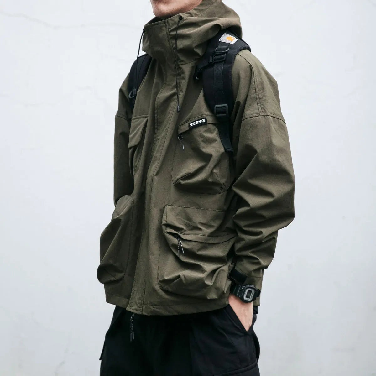 Damián | Chubasquero Hombre Impermeable con Capucha Múltiples Bolsillos