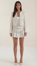 Doris – Conjunto de Tweed Crema con Falda